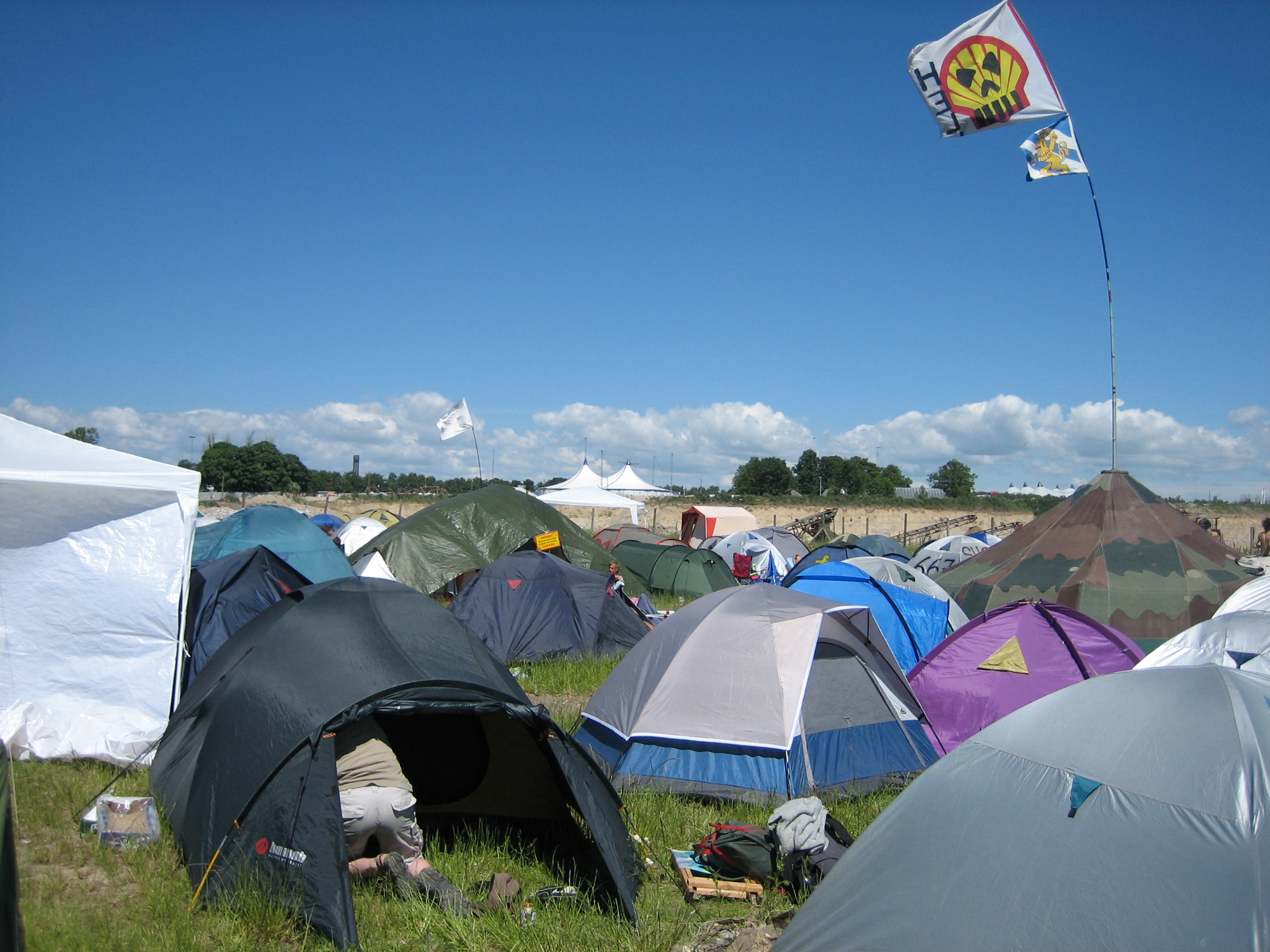 a group of tents sitting in the grass