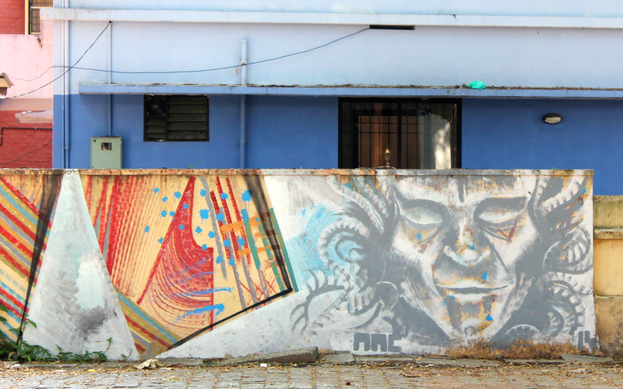 an image of three banners on the side of a wall