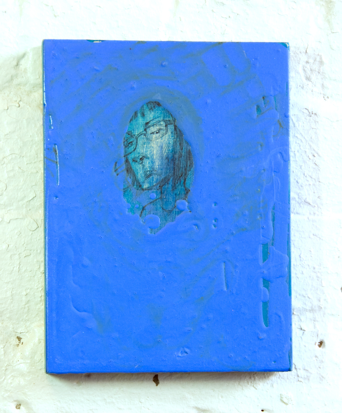 the top half of a painted wall in a blue frame