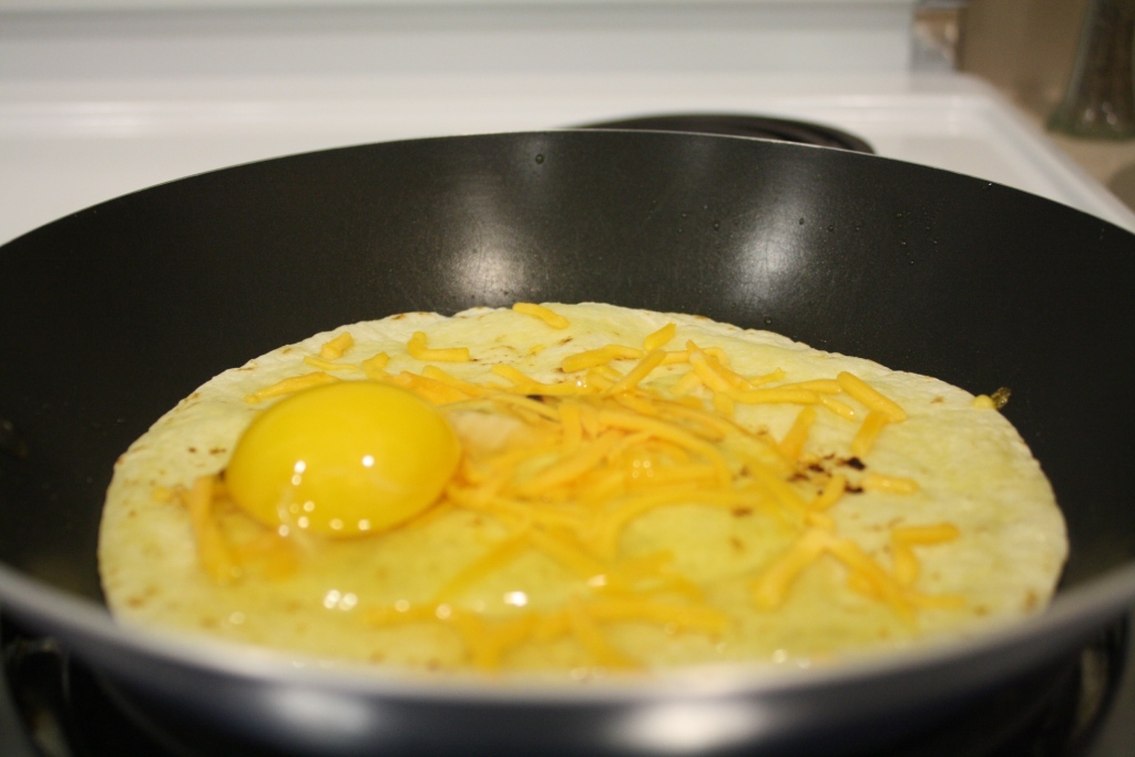 an omelet with cheese and egg inside of it