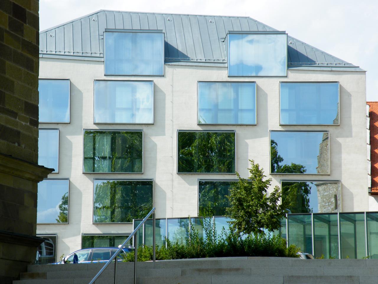 a building with many windows on the front of it