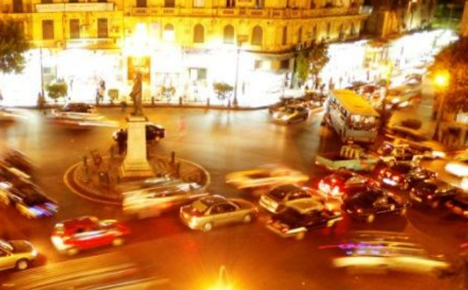 a street view looking at a busy intersection