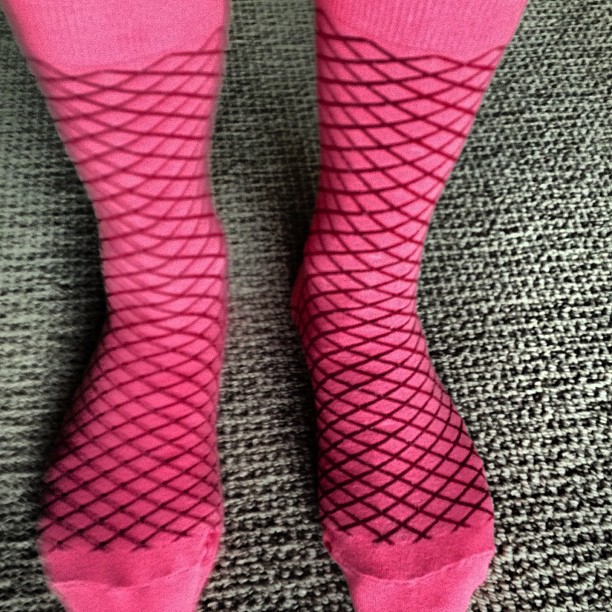 a close up s of someone wearing  pink socks