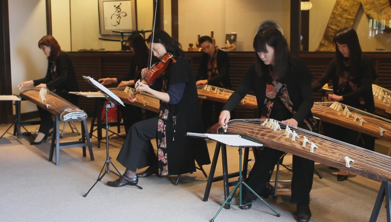 a band plays instruments at a chinese concert