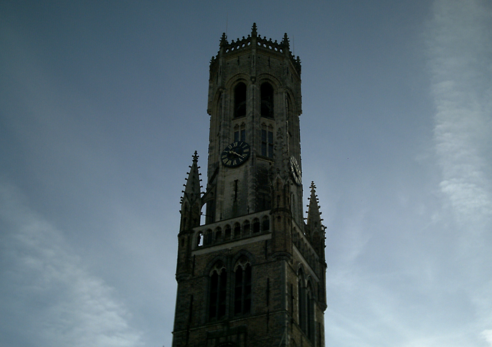 tall clock tower with a clock on top