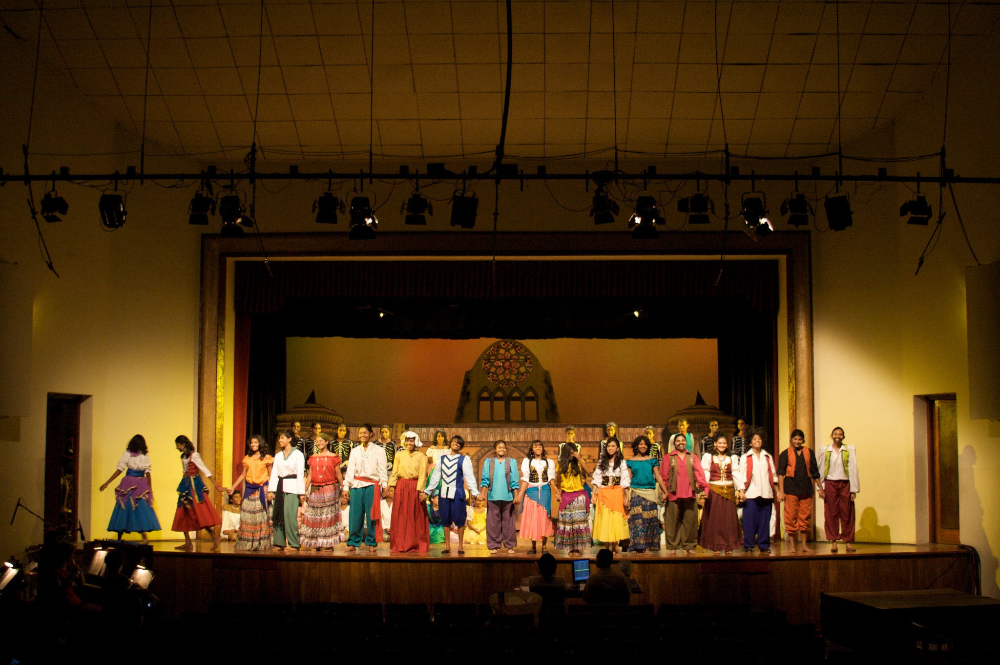 a group of people on a stage in front of an audience