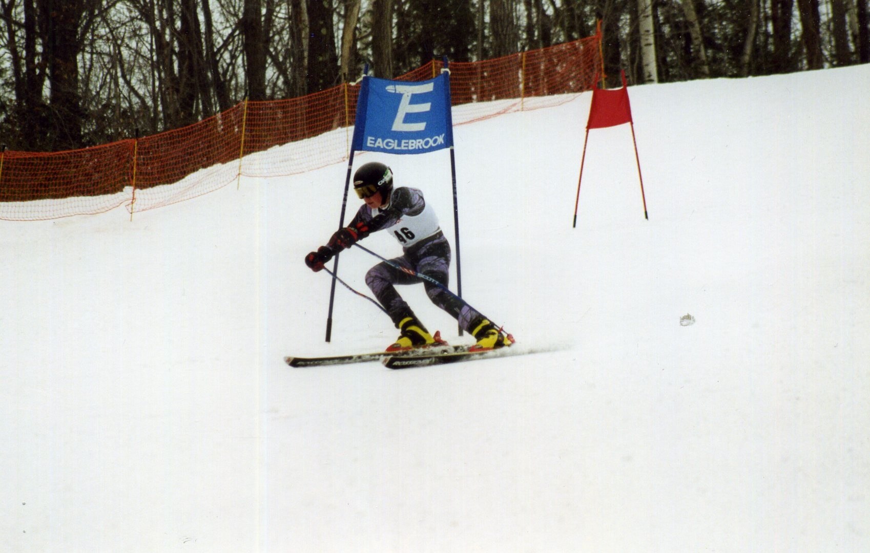 a skier going down the slope during a competition