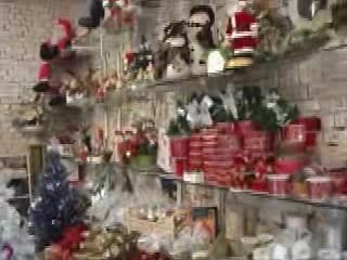 the shelves full of many different types of ornaments