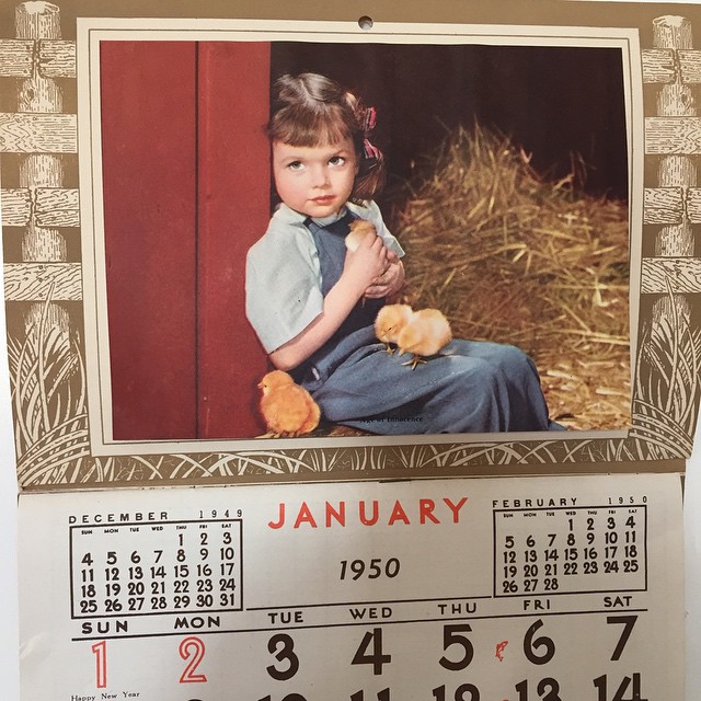 the small po frame is on display in front of the calendar