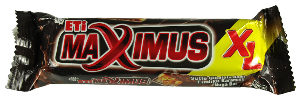 maximum x4 bar wrapped in chocolate, with its wrapper on the bottom