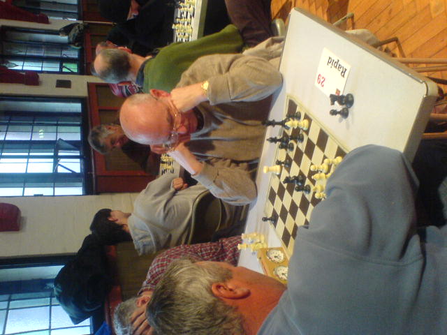 two men playing a game of chess together