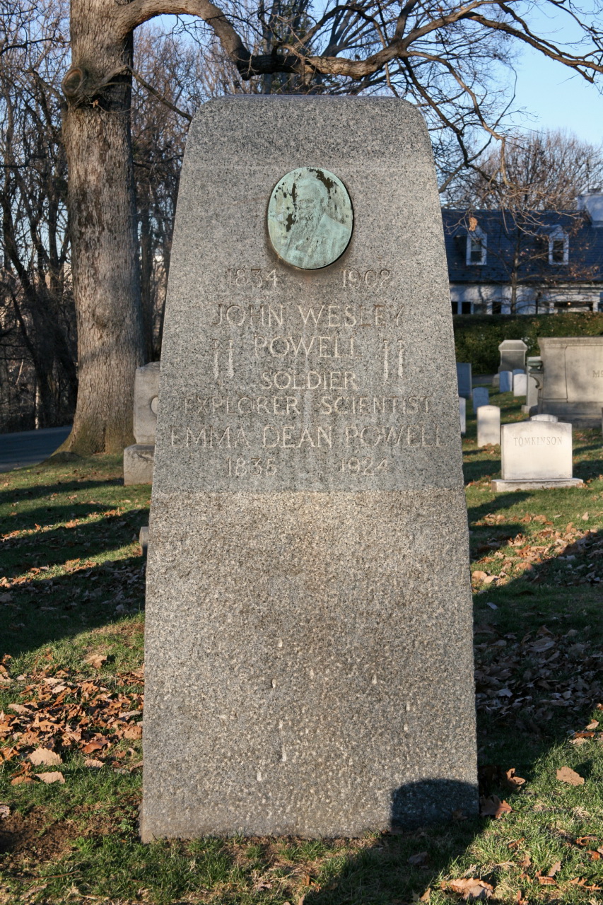 an old marker that is sitting in the grass