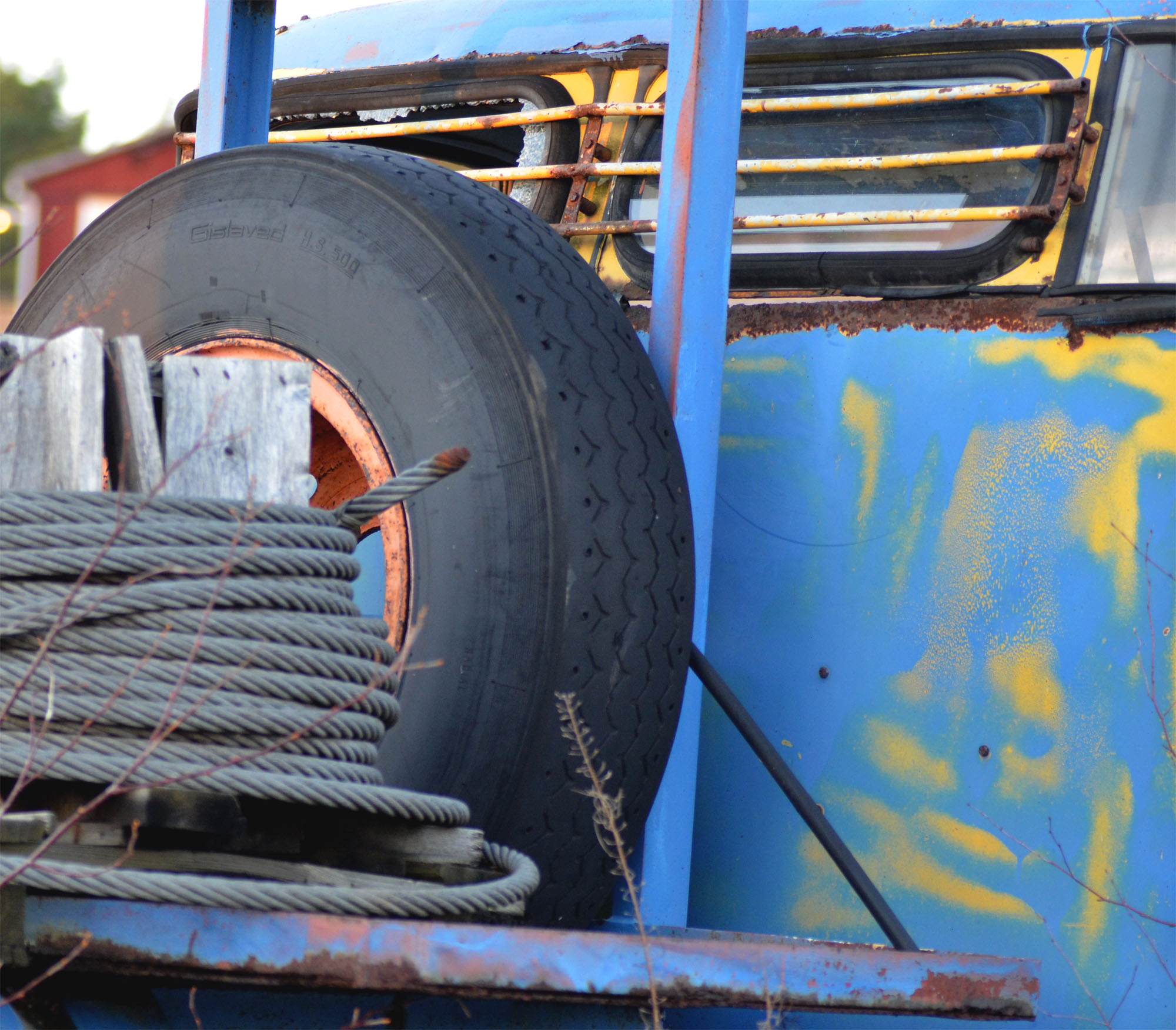 a large truck with some large tires around it