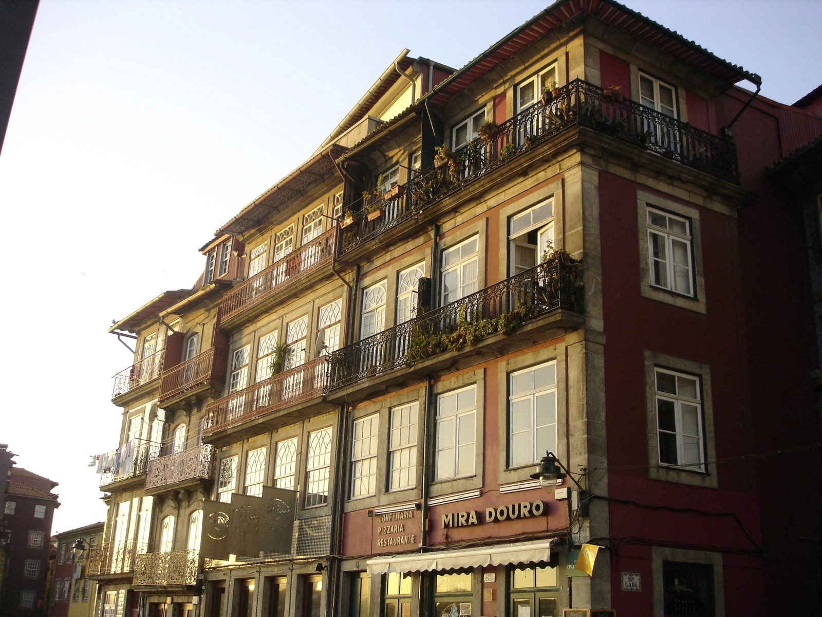 there is a building with balcony and balconies on it