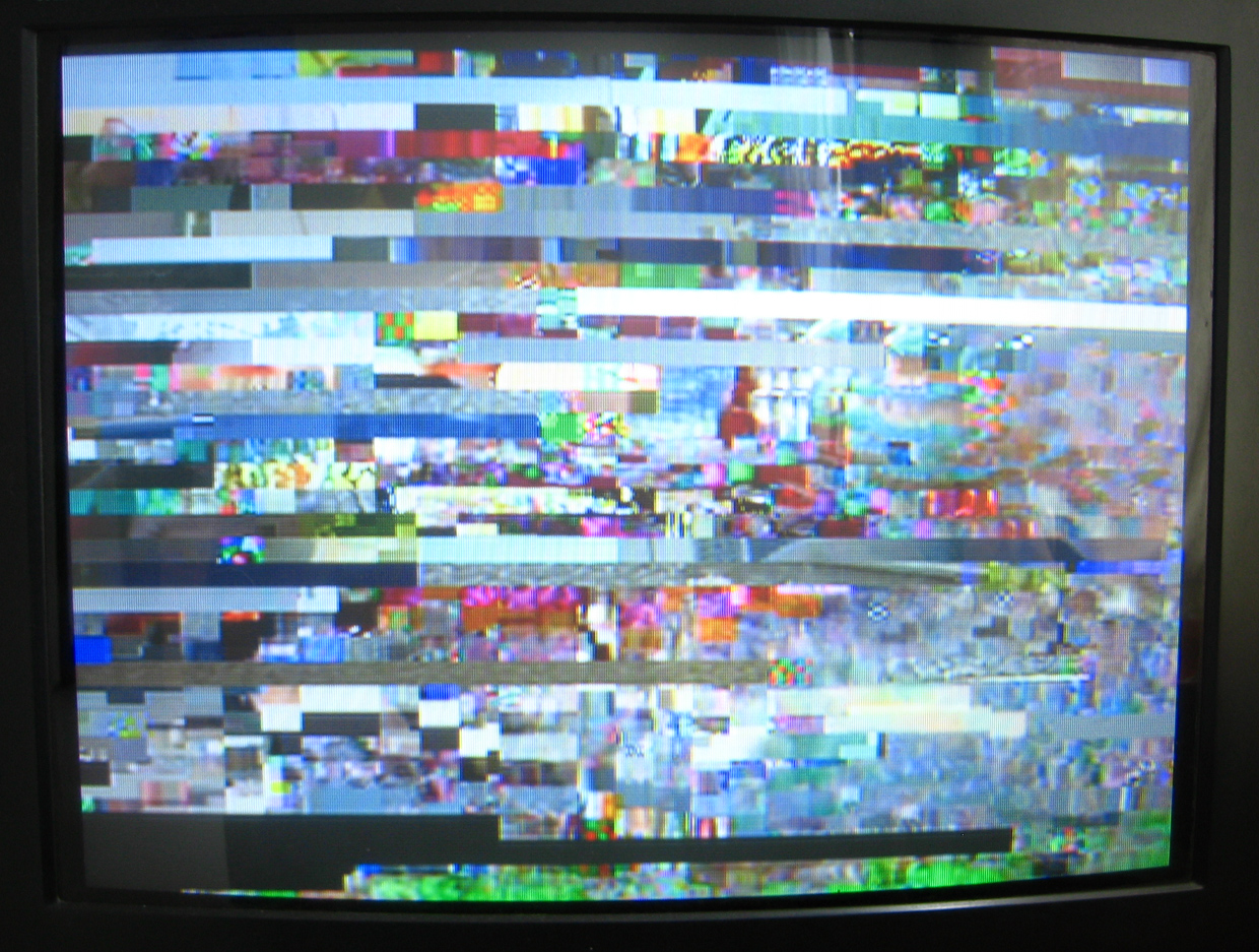 a large variety of colorful videos displayed on an old tv