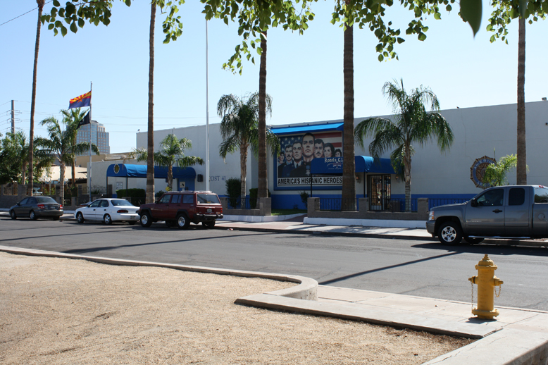 a very small shopping area with some cars on it