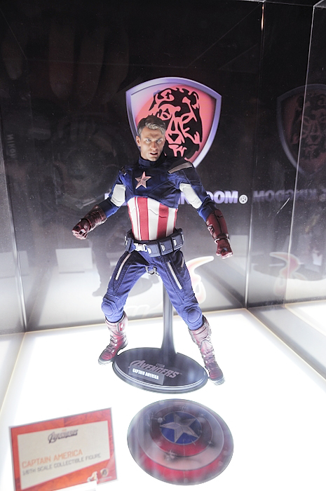 an action figure is shown in glass cases