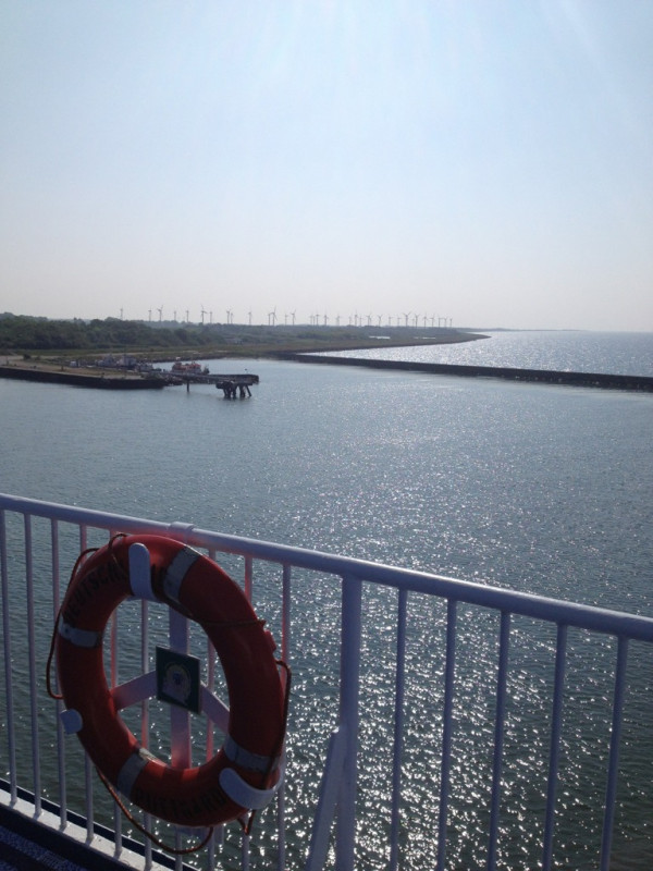 a life preserver sitting on the deck of a boat