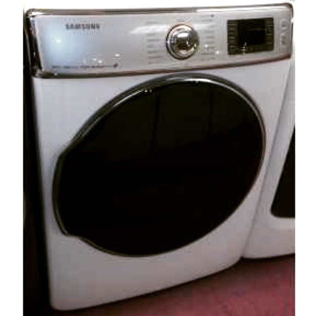 a close up view of a white appliance