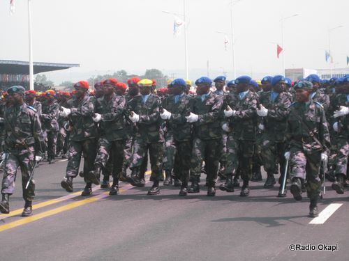 an indian military parade with a large number of people walking