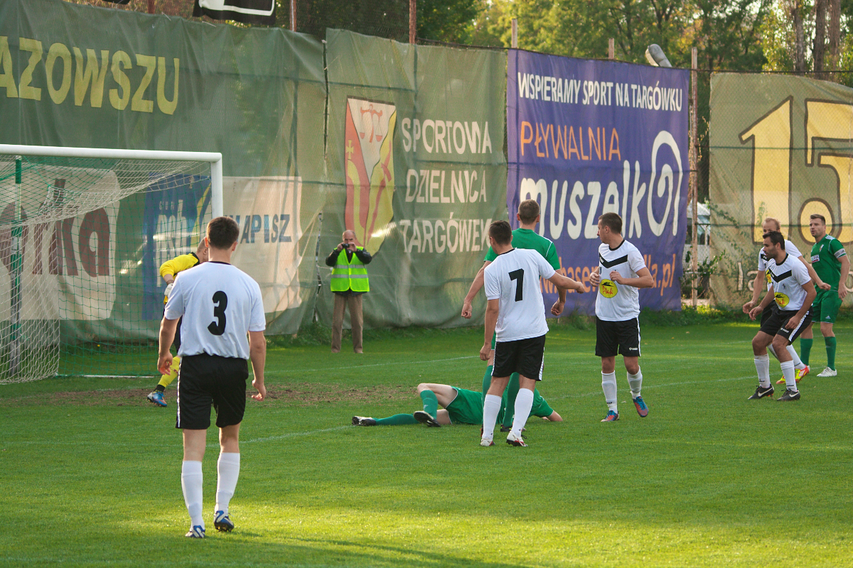 soccer players warming up before a game at the stadium
