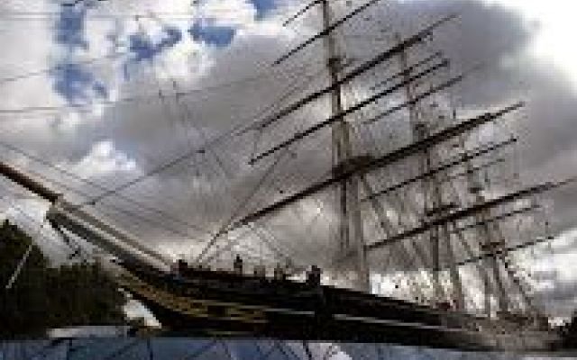there is a large sail ship that is in the water