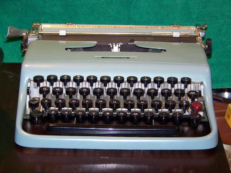 an old style typewriter is sitting on a table