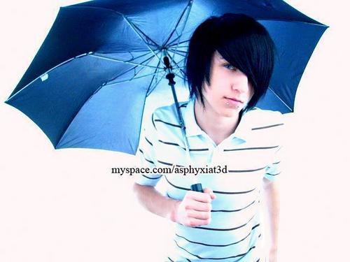 a person that is holding an umbrella near some kind of camera