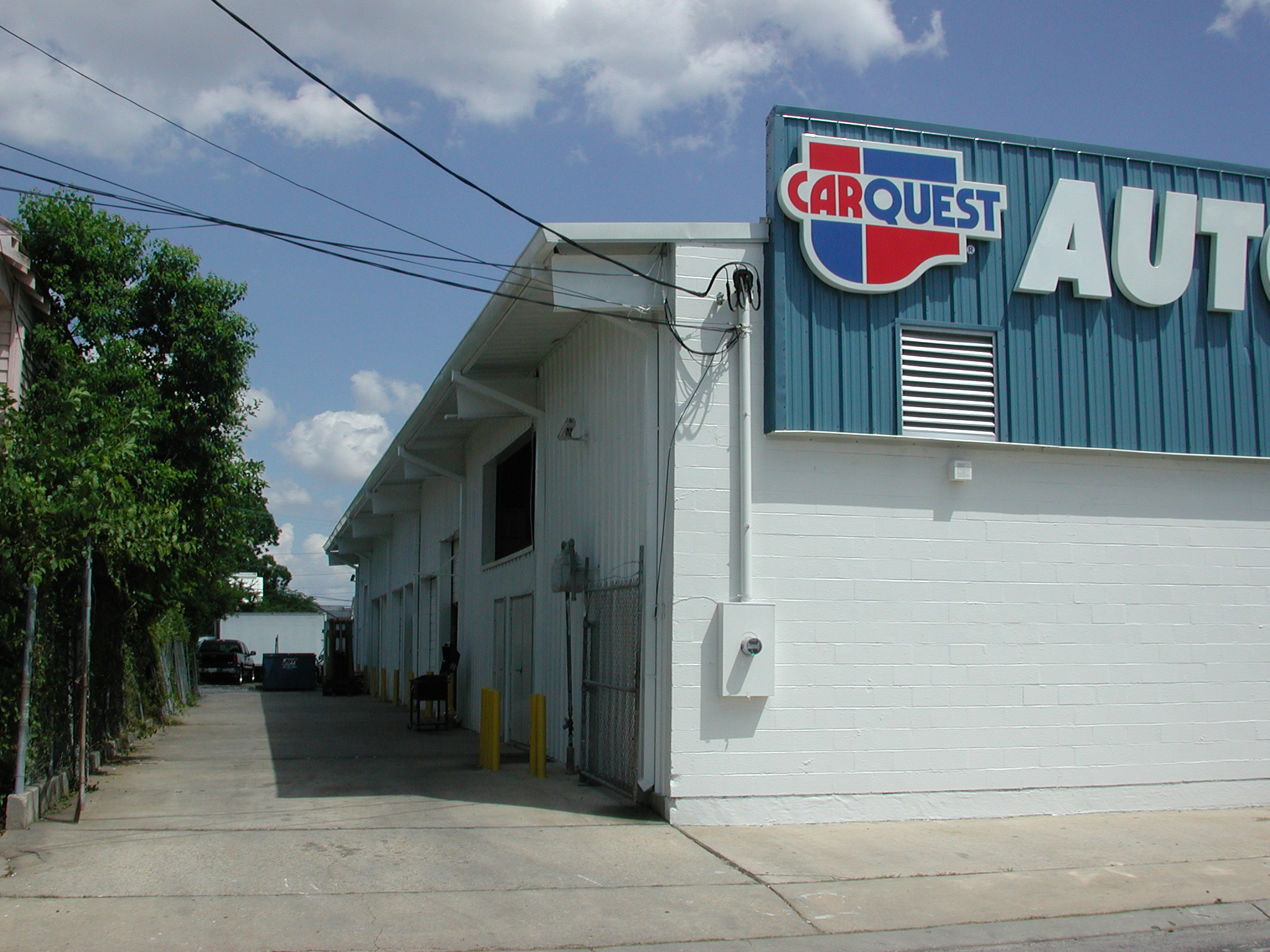 the outside of an auto quest garage where it is located