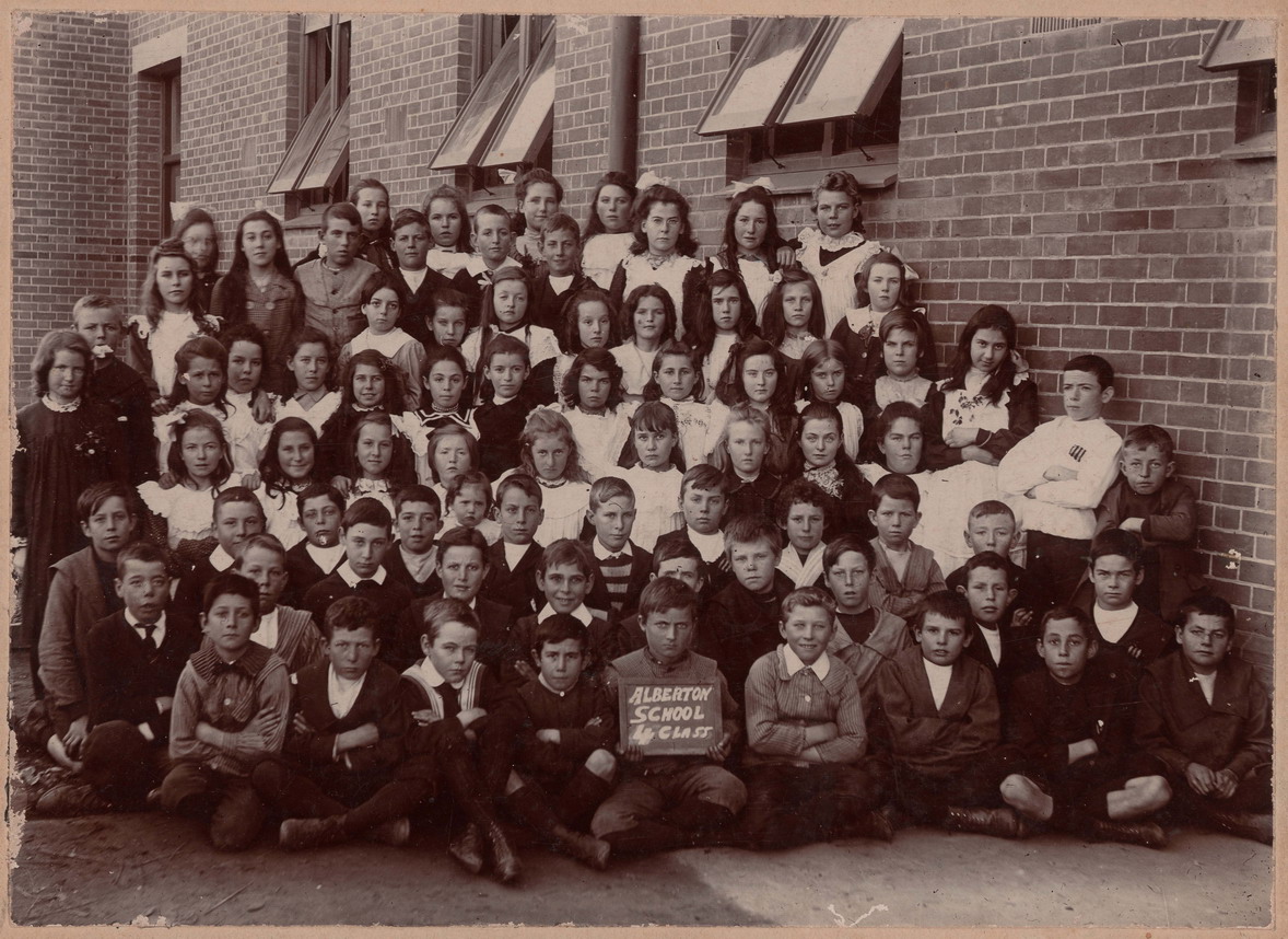 black and white pograph of a group of people posing for a picture