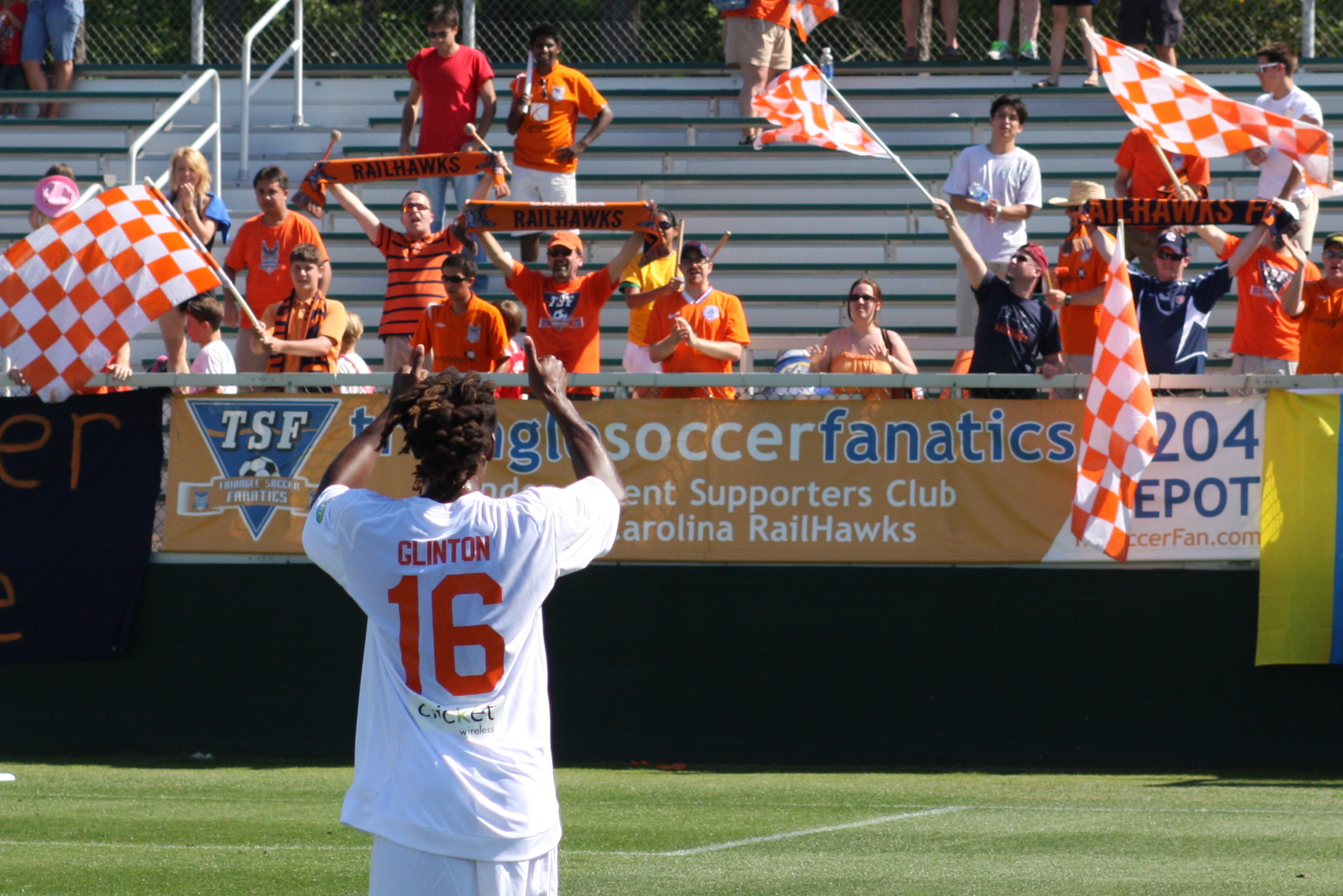 a  saluting on the soccer field