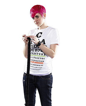 a woman holding up an item with pink hair