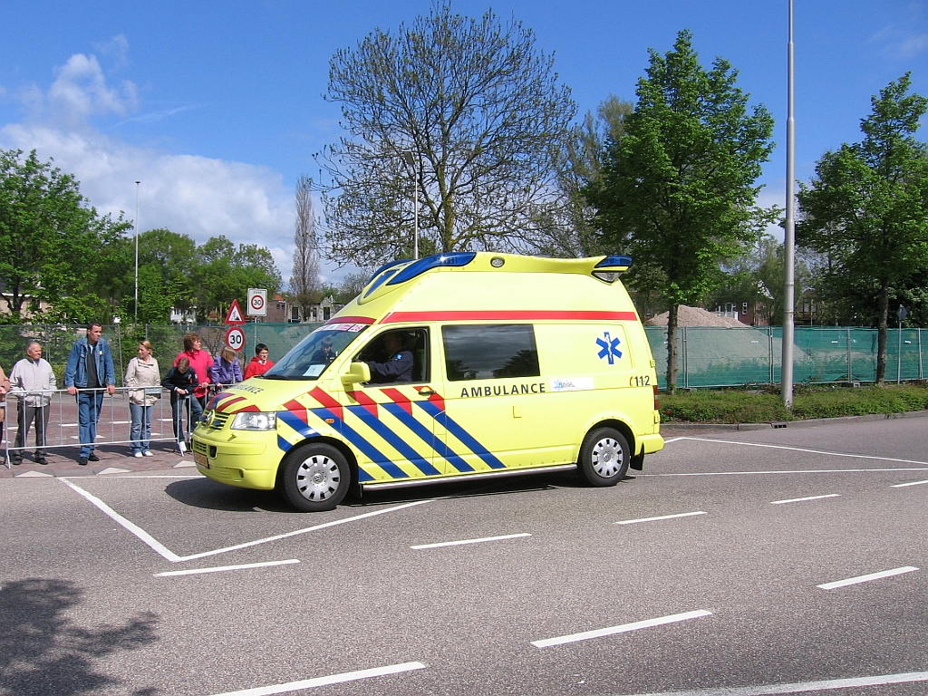 an ambulance is parked outside in the parking lot