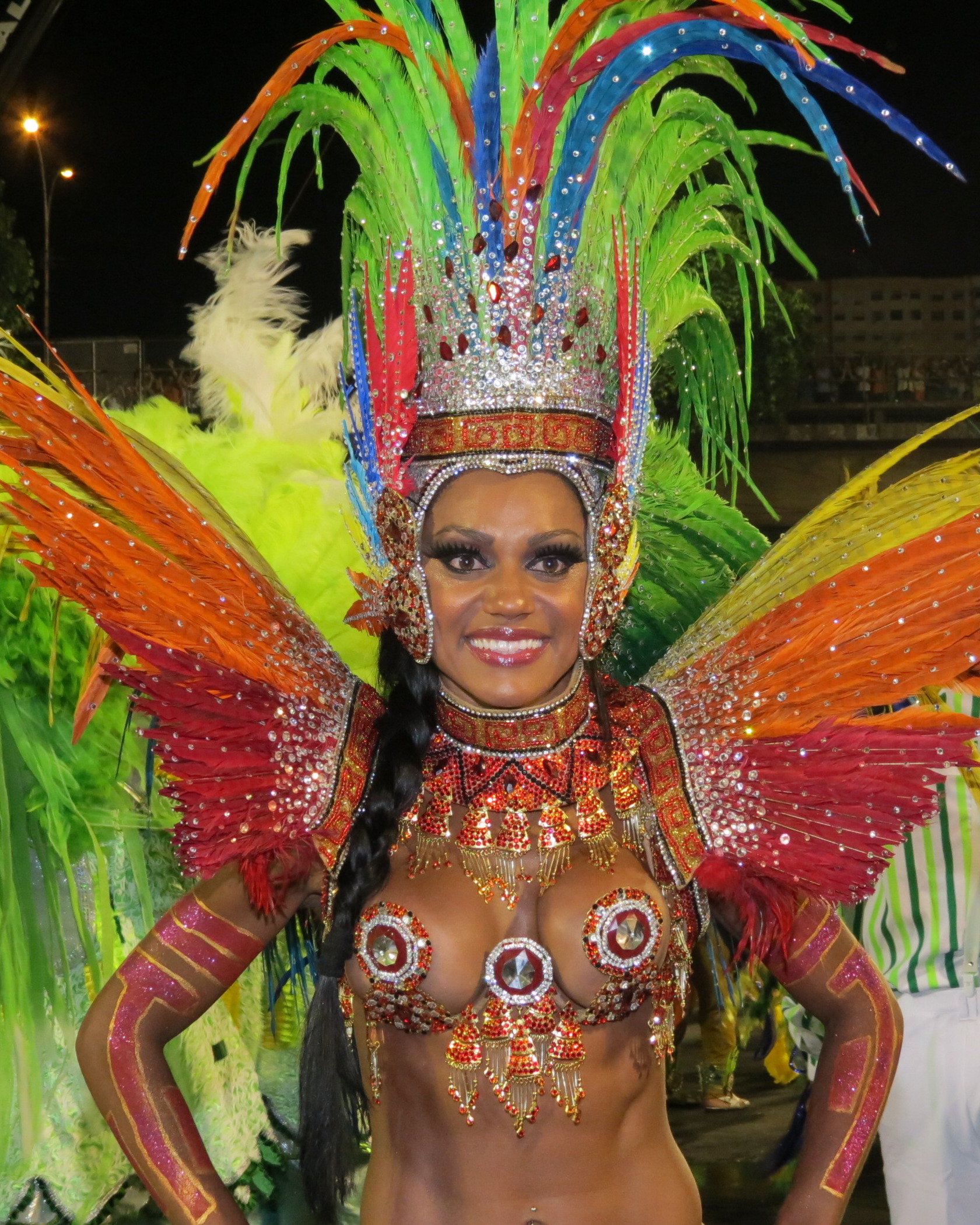 a beautiful woman wearing a very big colorful costume