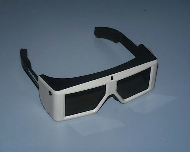 an old white pair of glasses with 3d glasses attached