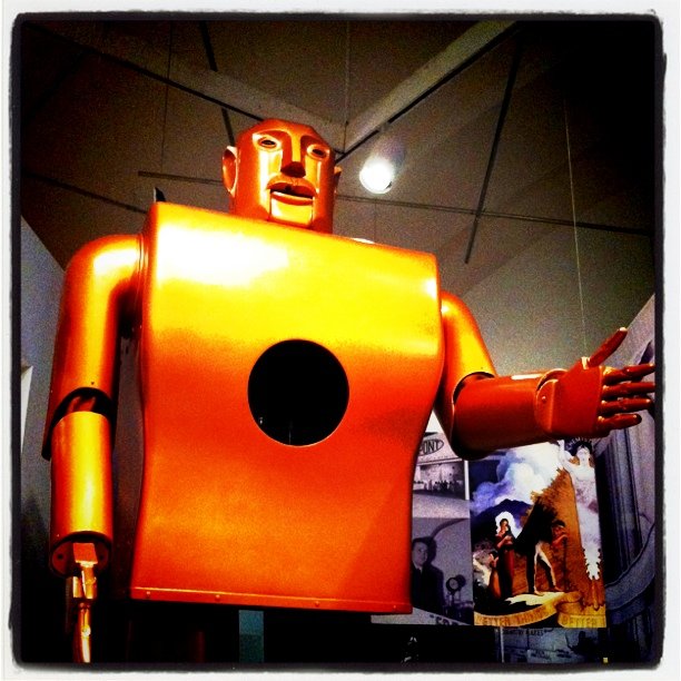 a close up of a robot in a museum