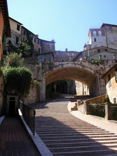 a narrow cobblestone street in old town