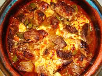 the bread and sausage casserole is prepared in a pan