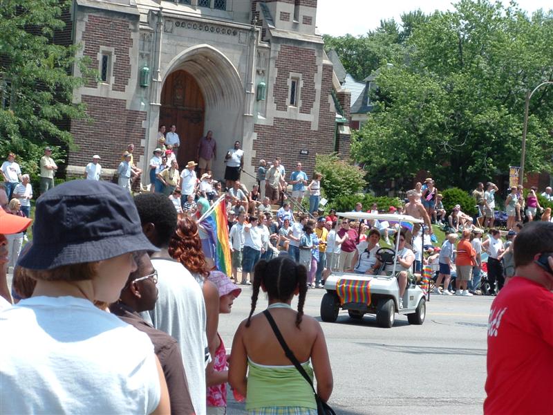 people are watching the parade on the streets