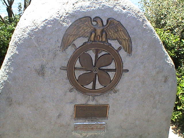 there is a plaque with an eagle at the base