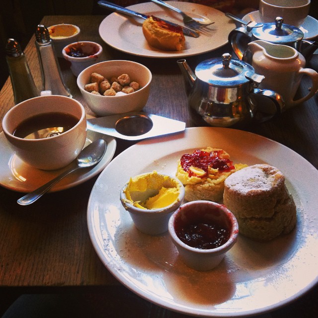 breakfast is set out with coffee, tea, and cookies