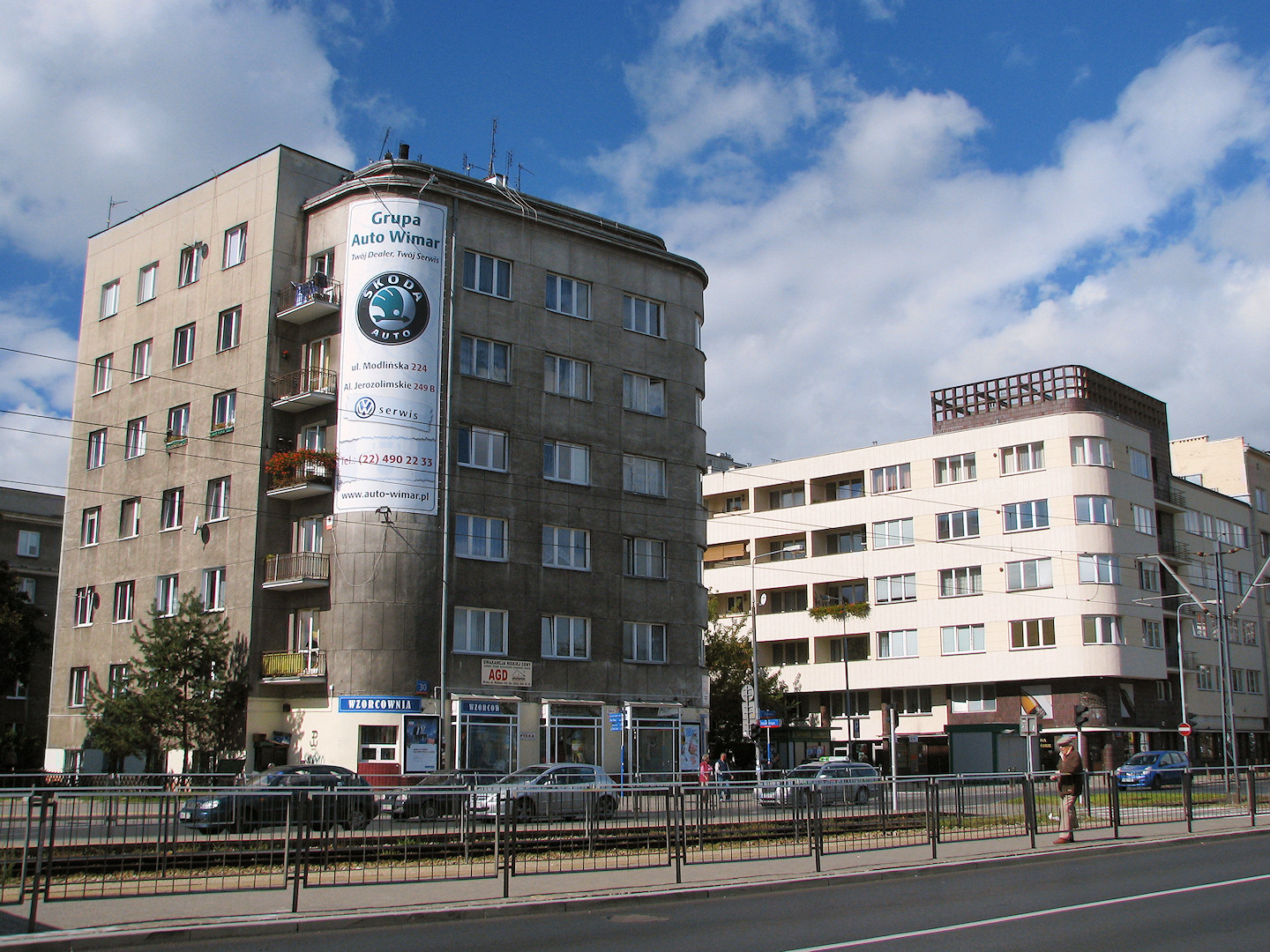 a street view with multiple buildings in the background