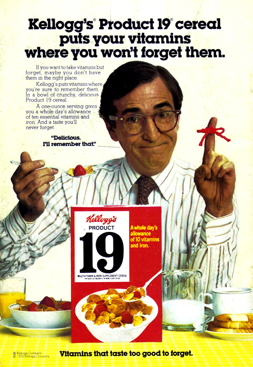 a man wearing glasses standing behind cereal box with a star shaped fork