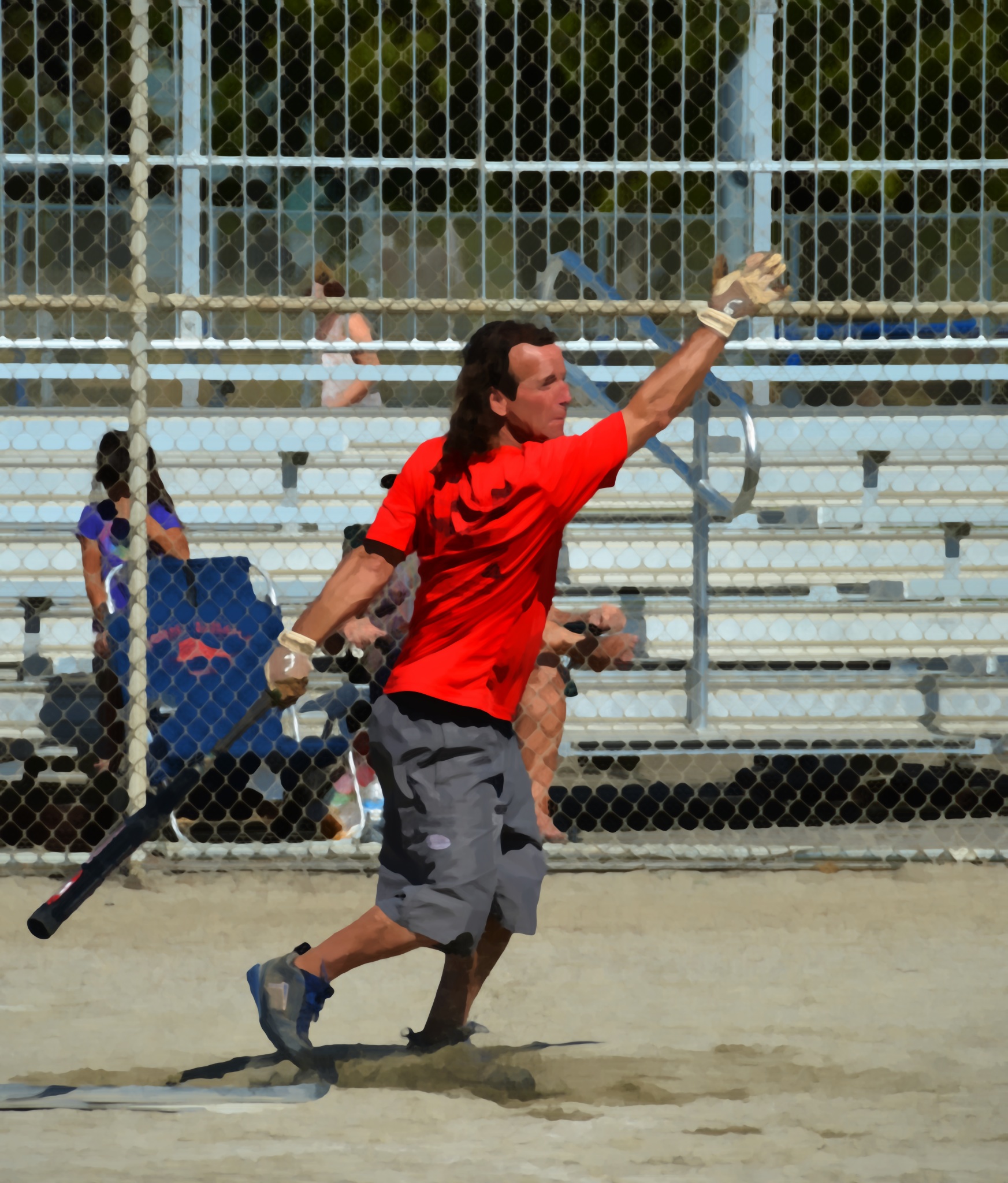 a man standing on a baseball field with a bat