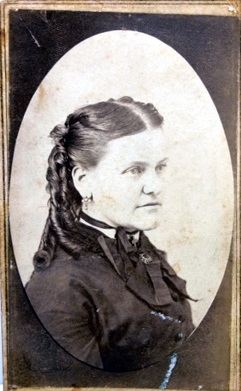 a picture of a very old lady with long hair