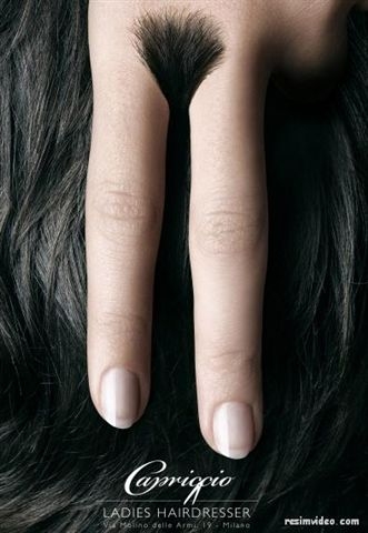 a person with long nails and some sort of fake fake hair