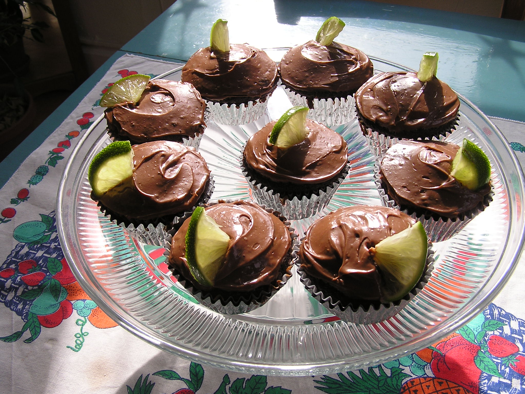 several cupcakes sitting on top of a plastic tray