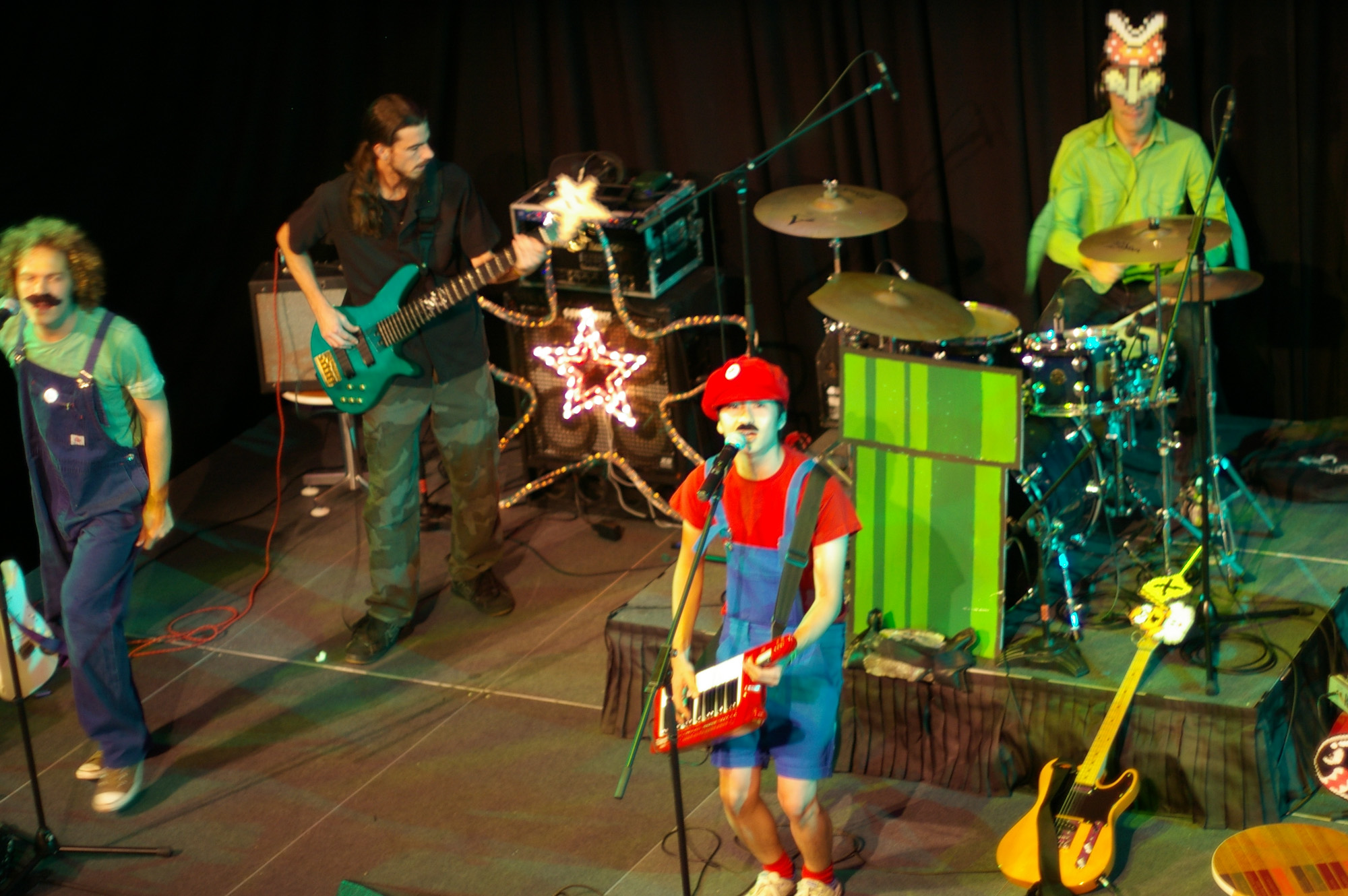 a band with clown makeup playing a band