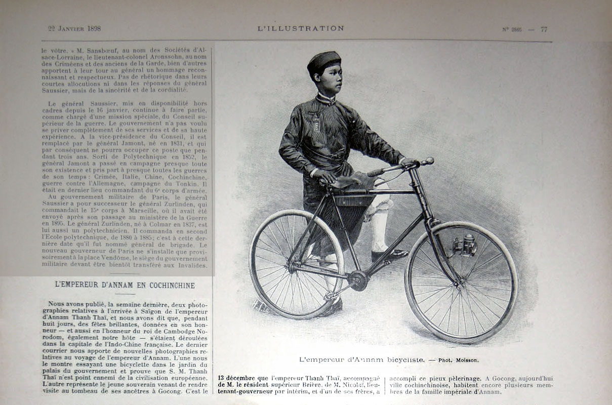 an image of a man standing on top of a bicycle