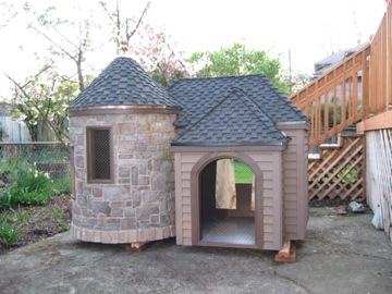 dog house with brick chimney and tile roof